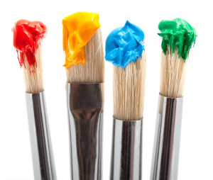 four paintbrush with color, tool for painting against white background